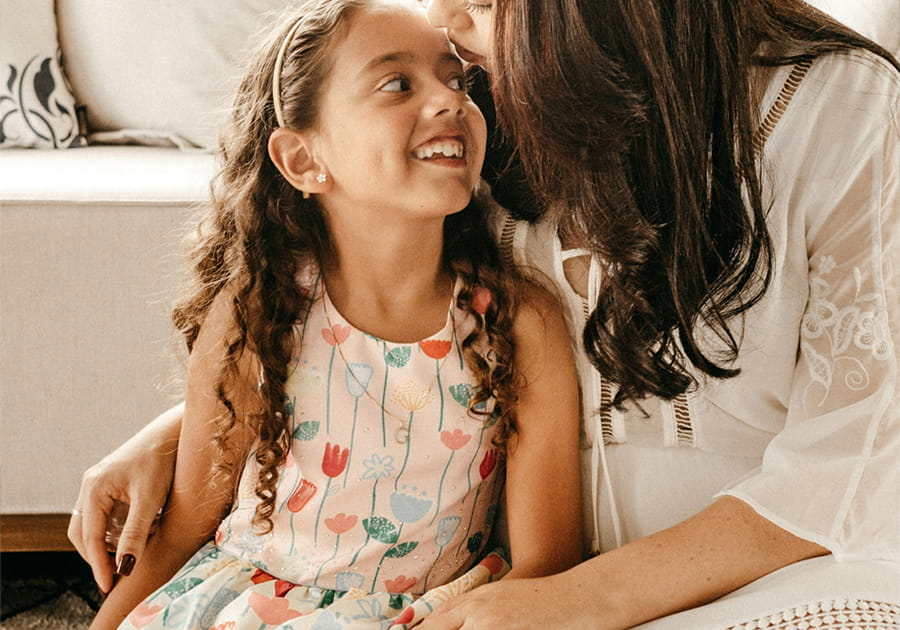 child smiling at mom